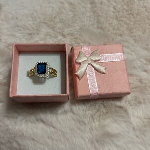 Gold Ring with Deep Blue Square Crystal and Halo Accent